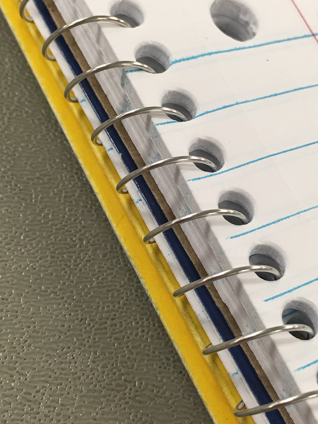 A spiral-bound notebook photographed close up.